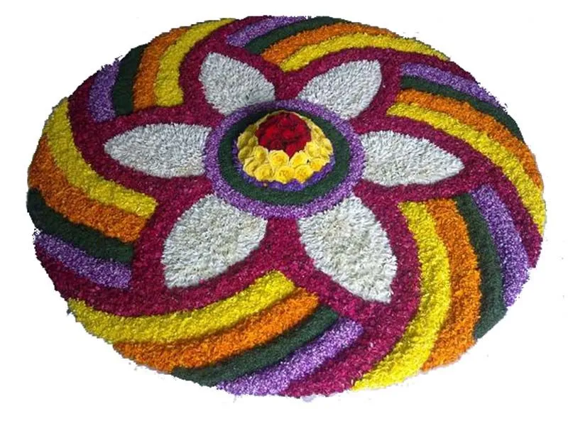 Onam Pookolam Design with Multicolour Petals free Wallpaper