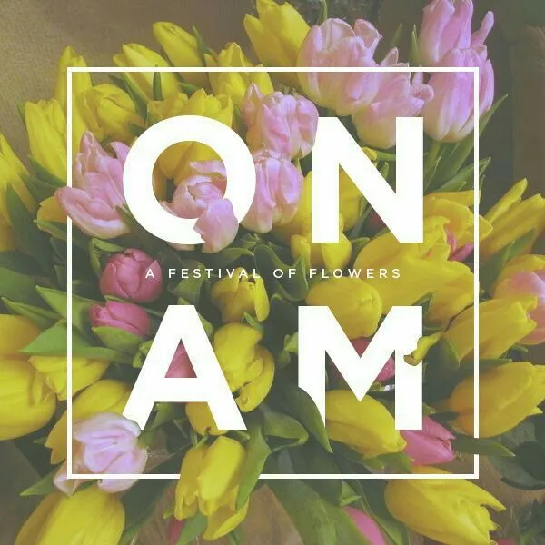 Onam text with white colour and yellow and pink flowers