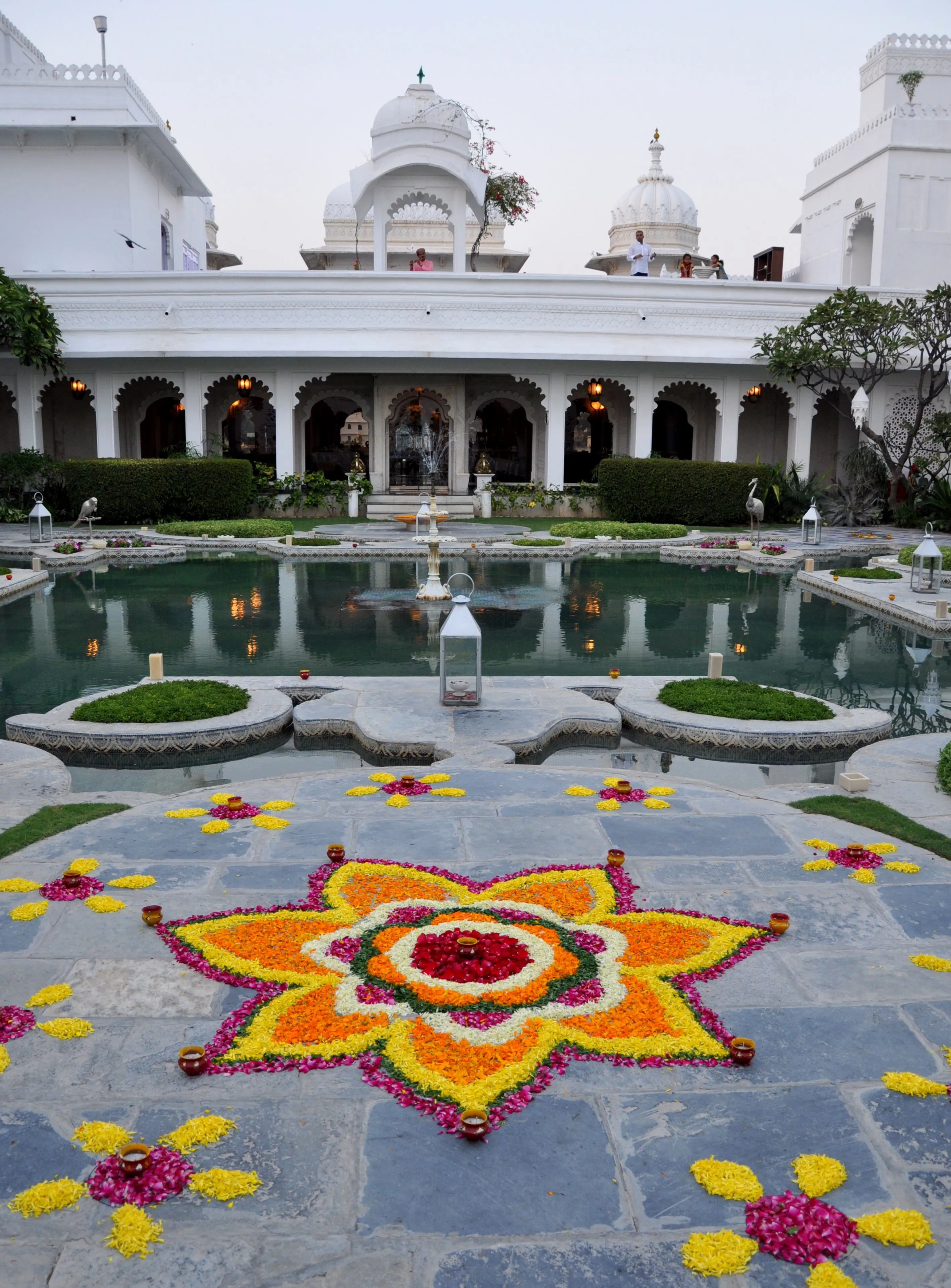 Onam with flower and lamp design athapookolam in onam poster
