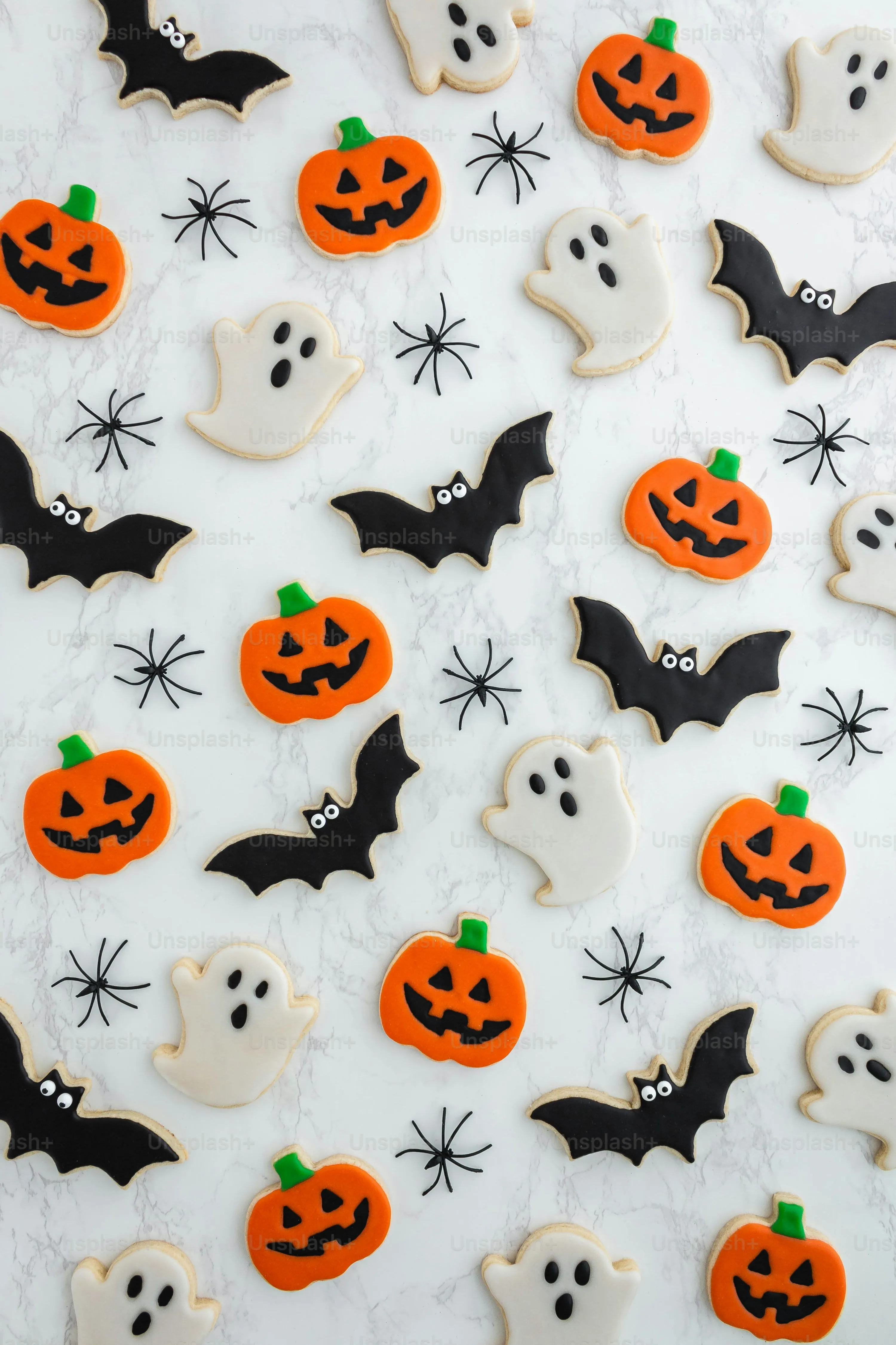 Pattern Of Halloween Pumpkins Bats and Ghosts on Fabric
