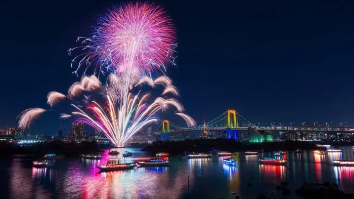People Enjoying Fireworks and Sparklers at Night image