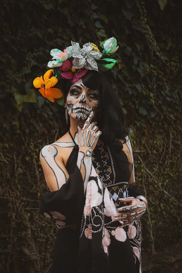 Person in Floral Outfit and Skull Makeup for Halloween