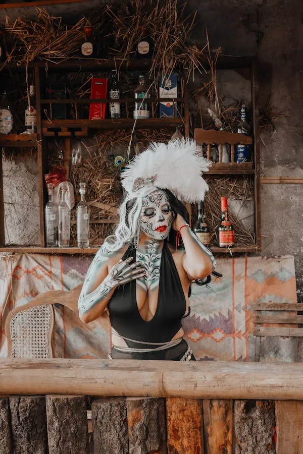 Person in Skeleton Makeup at Rustic Indoor Halloween Setting