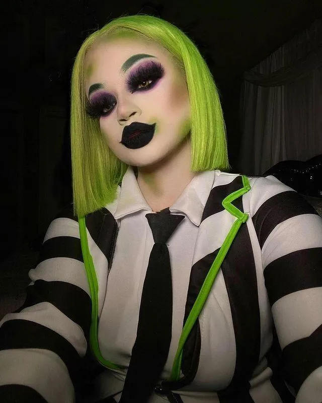 Person in Striped Halloween Costume and Green Hair image