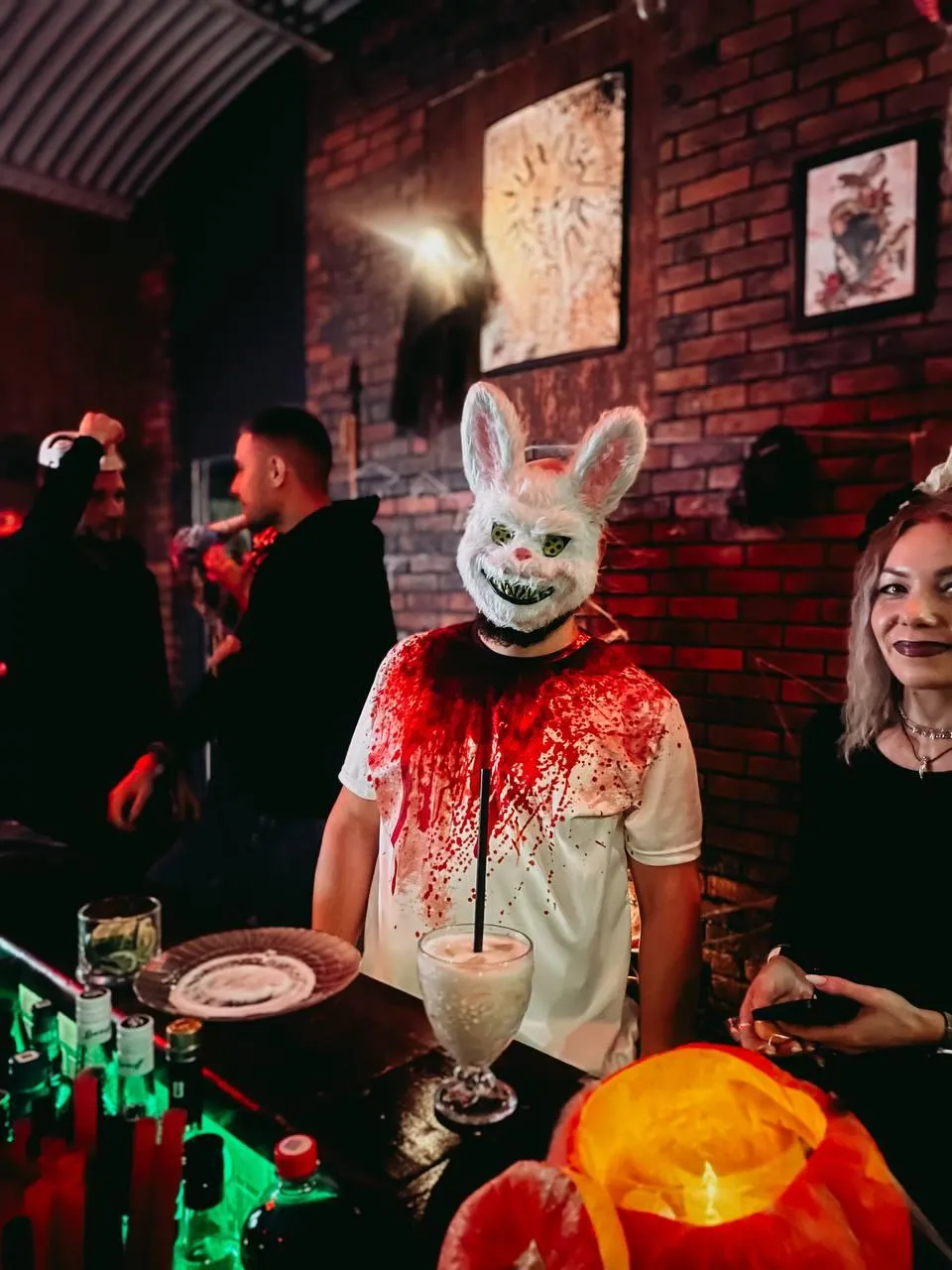 Person Wearing Bloody Bunny Mask at Halloween Party
