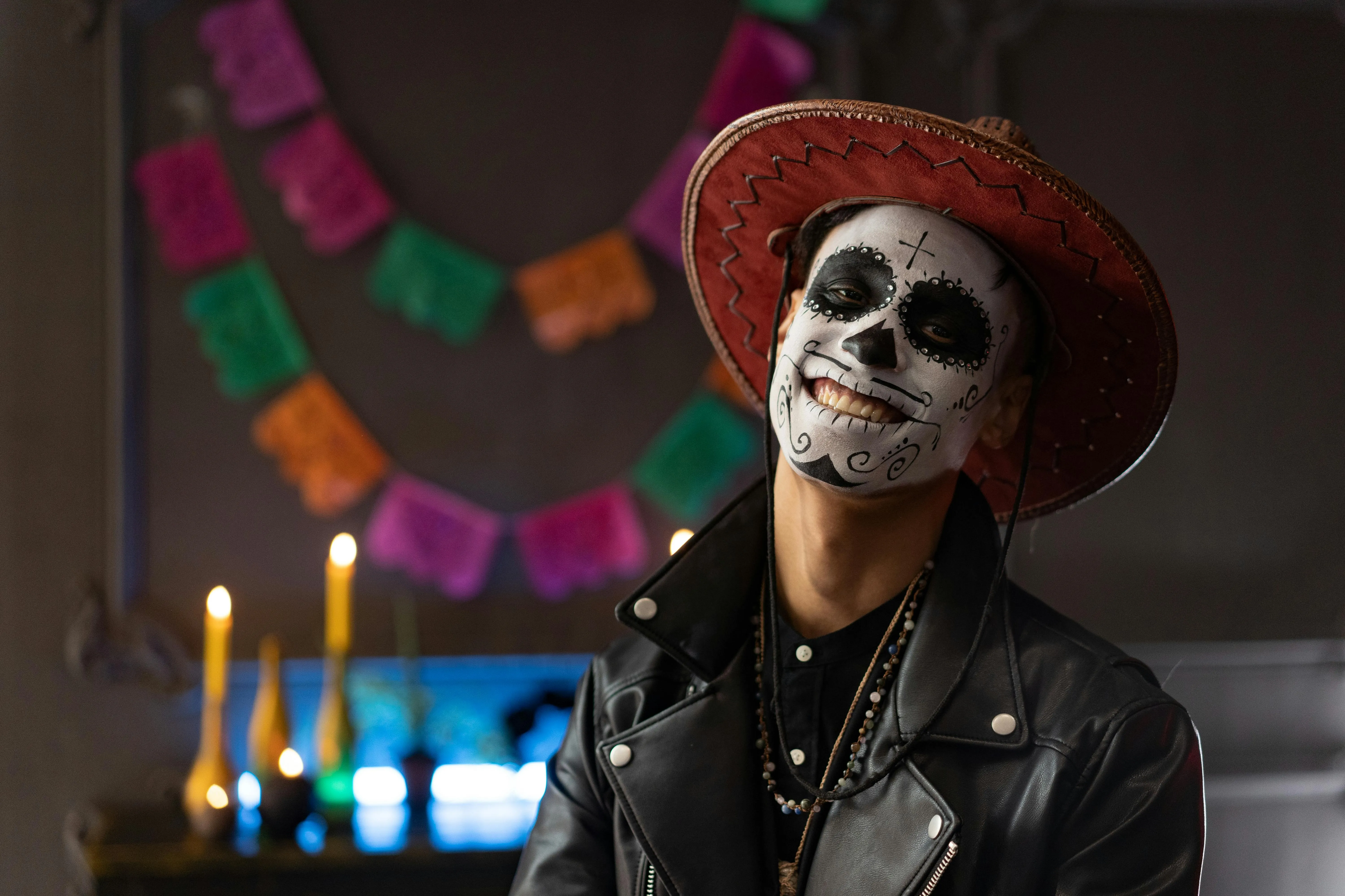 Person with Skull Makeup and Sombrero in Halloween Costume