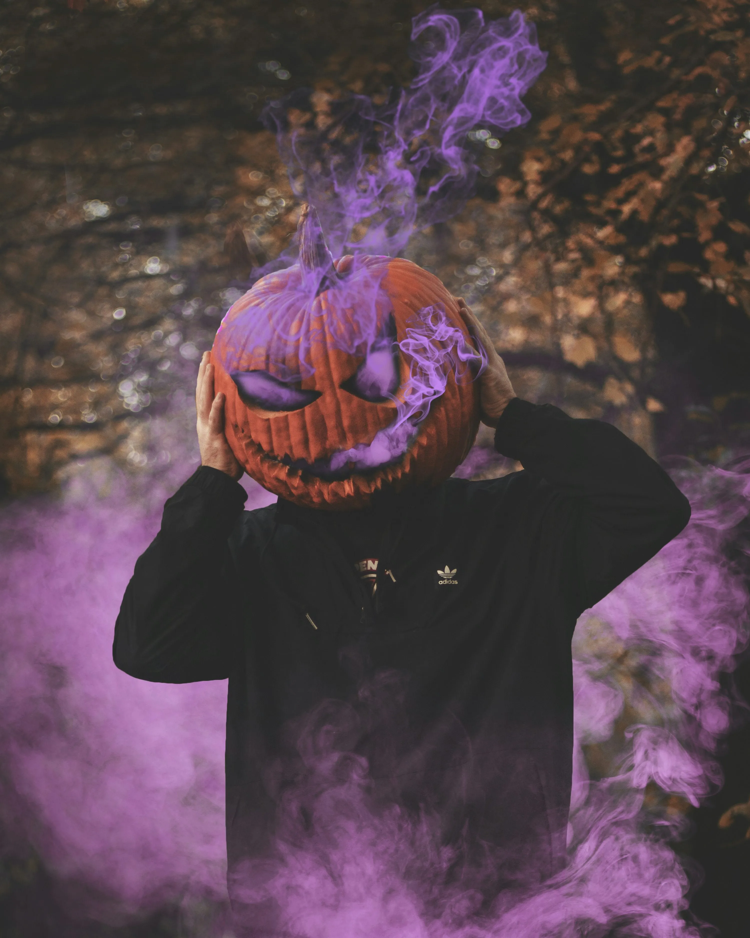 Person with Smoking Pumpkin Head Costume Wallpaper