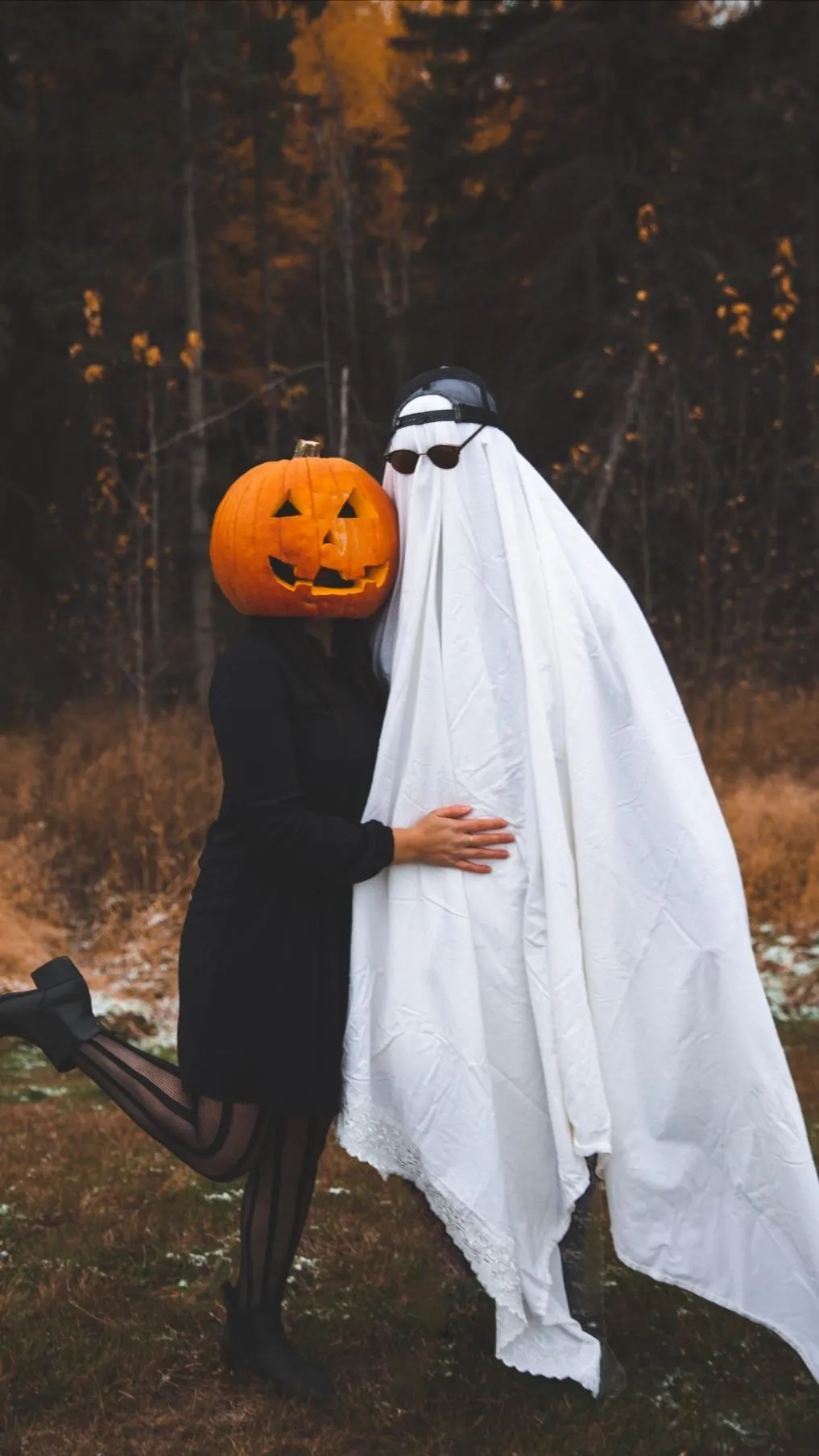 Playful Pumpkin Ghost Costume Hugging at the forest HD