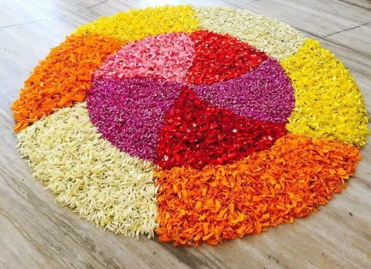 Pookolam in concentric circles with multicoloured petals