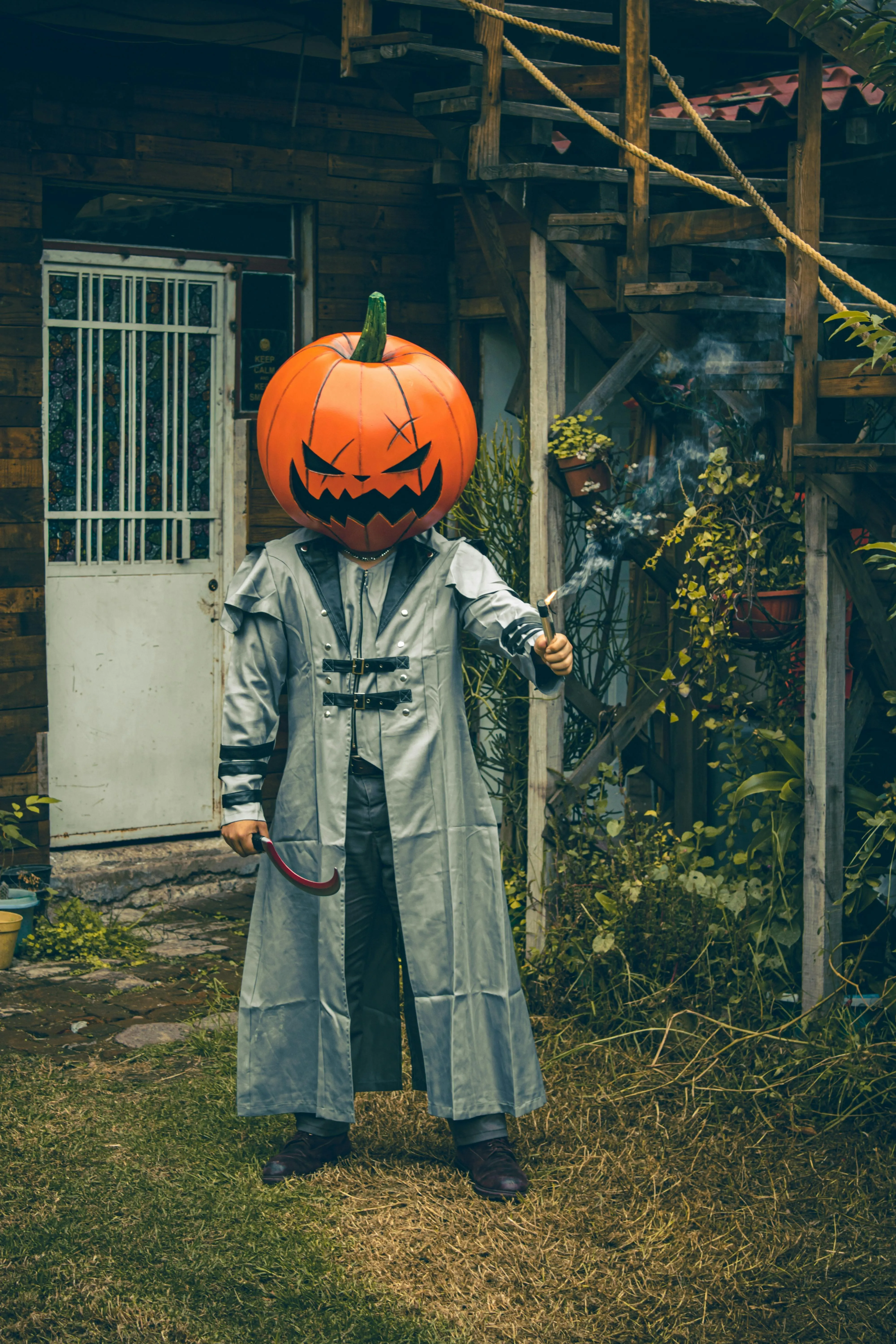 Pumpkin Head Costume with Ghost Body in Yard Wallpaper