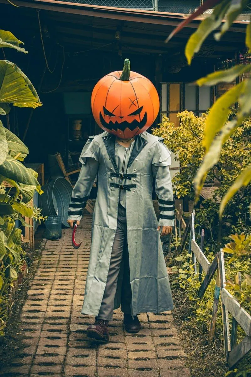 Pumpkin Head Wearing Long Coat Halloween Costume Wallpaper