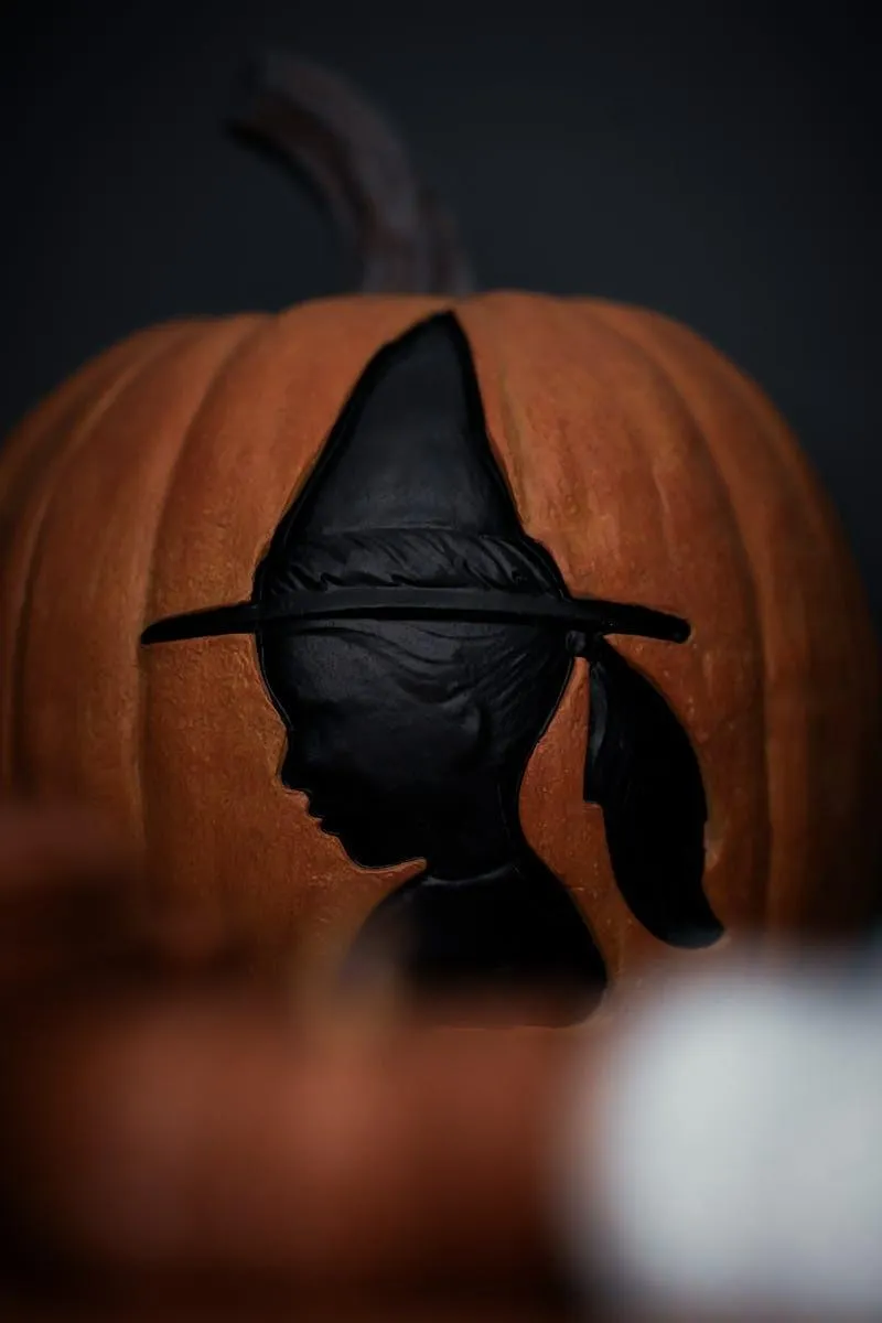Pumpkin with Black Witch Hat Decoration Witth Black Background