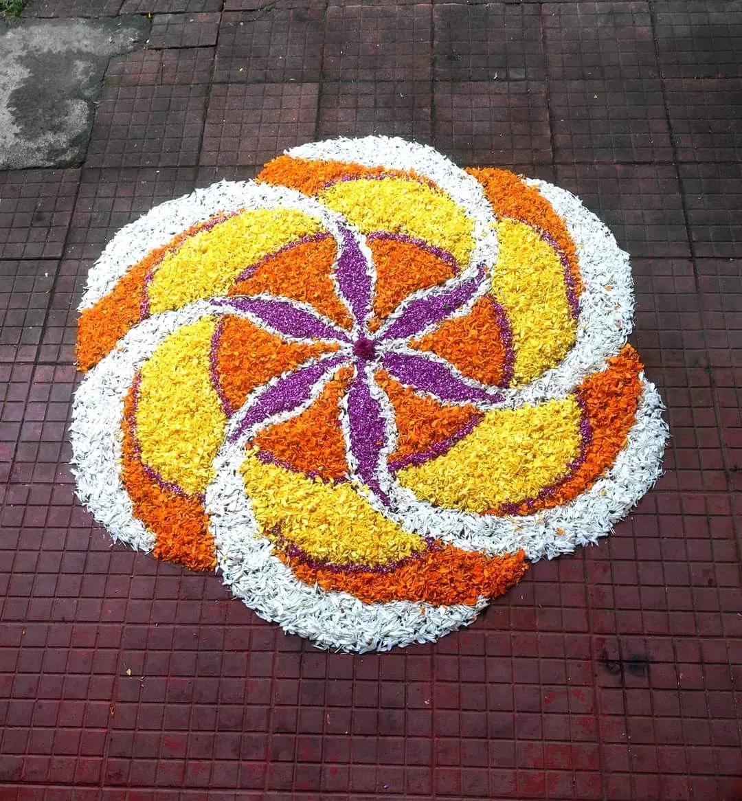 Purple with white spiral effect floral pookolam HD image