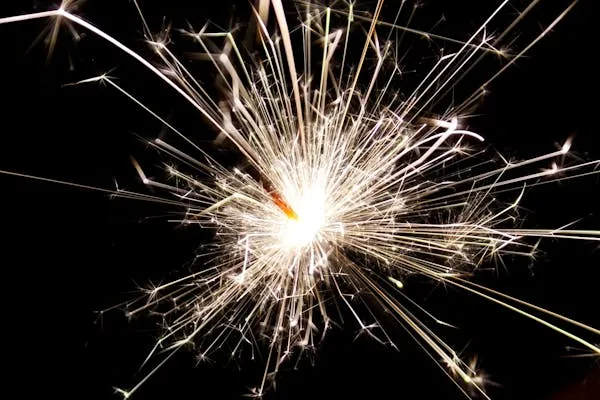 Radiant Fireworks Erupting in the Dark Night Sky image