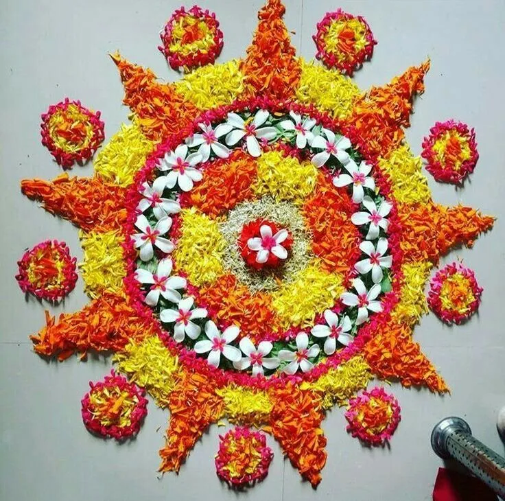 Radiant sun design pookolam design with fresh flowers image