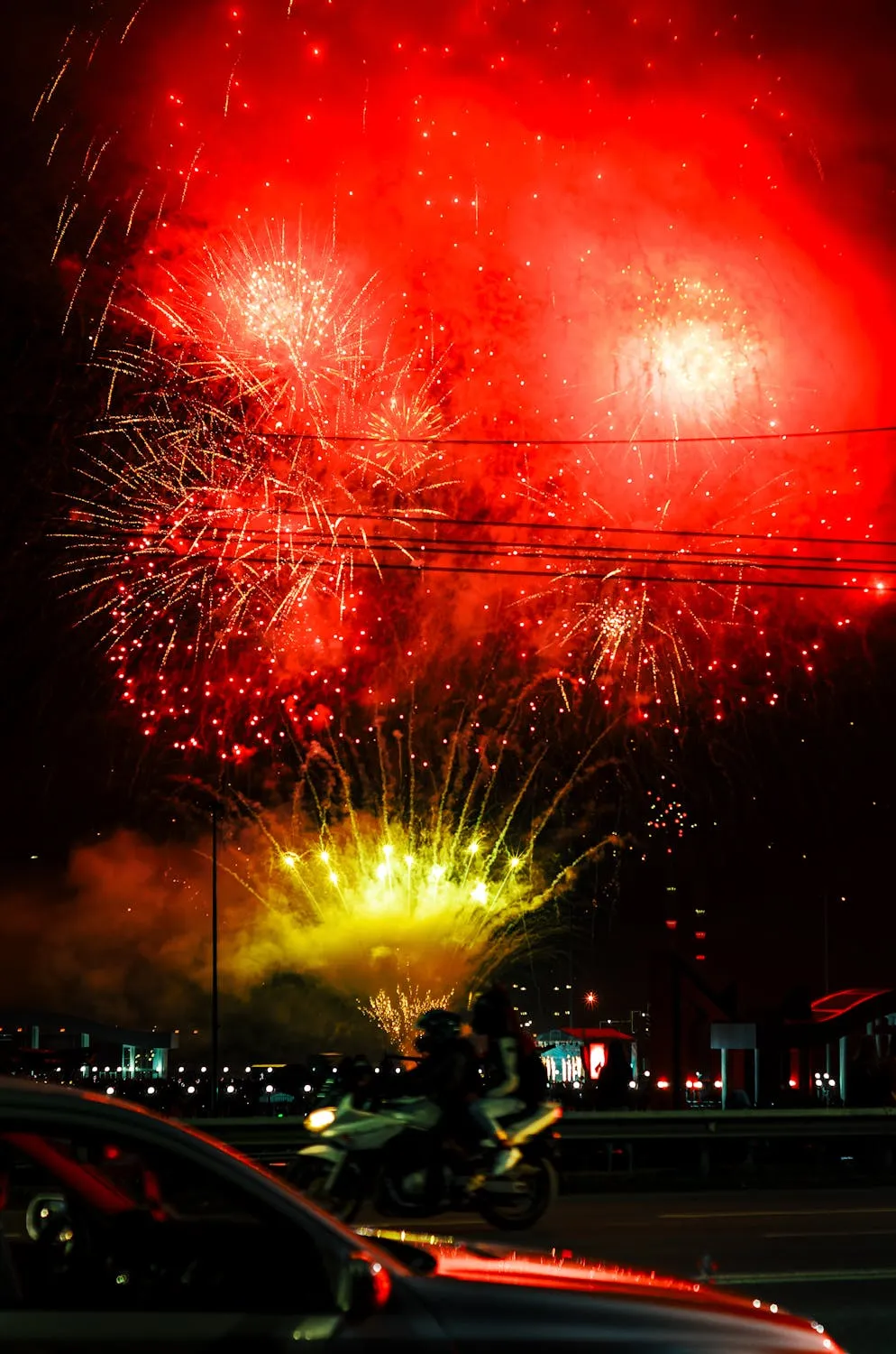 Red fireworks lighting the sky with intensity wallpaper