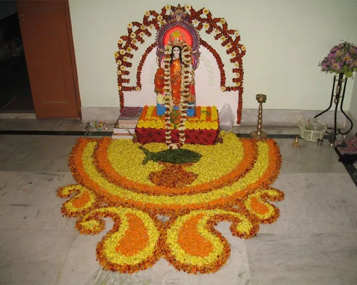 Saraswathi puja floral rangoli with paisley design wallpaper