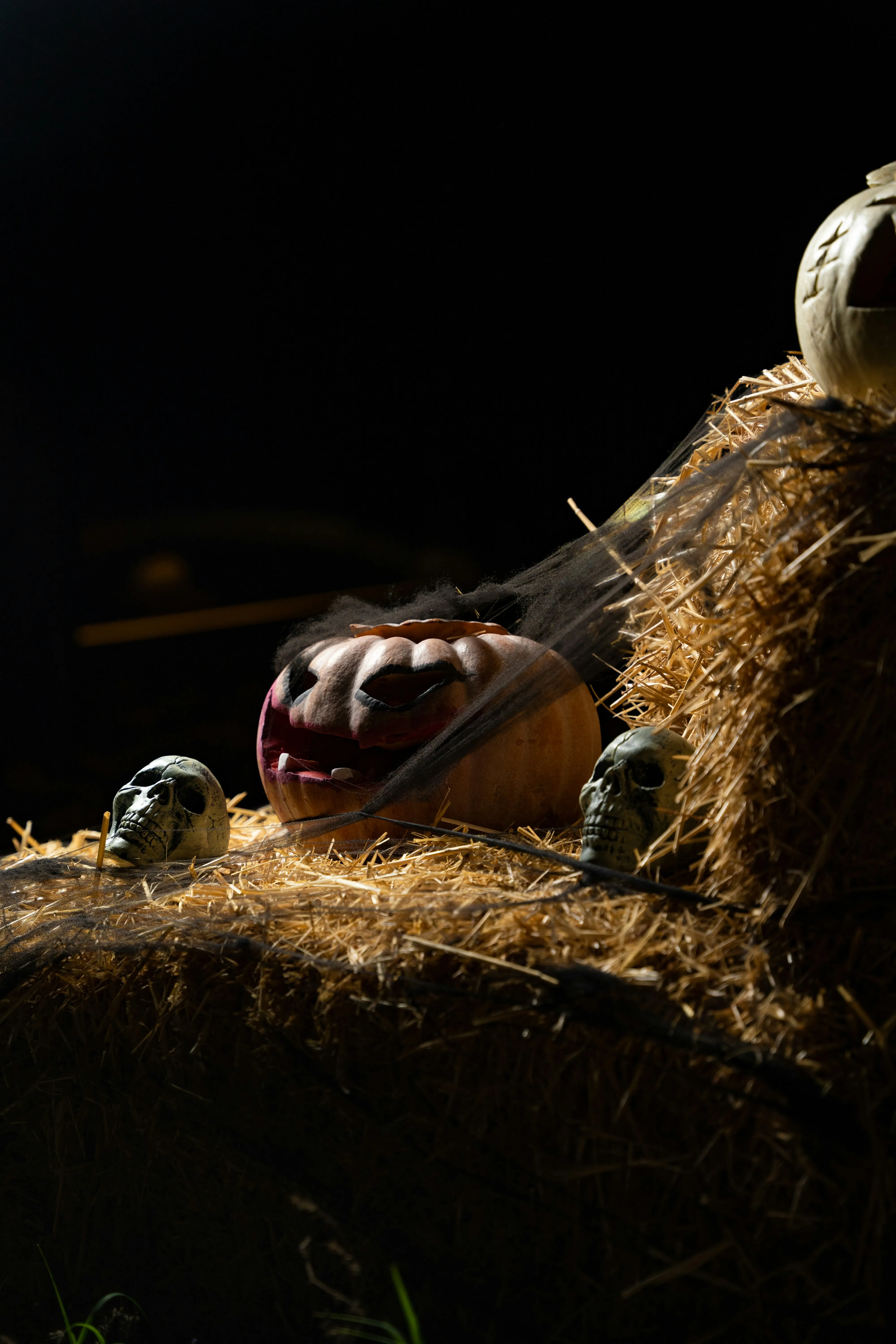 Scarecrow in Haystack with Halloween Pumpkins Wallpaper
