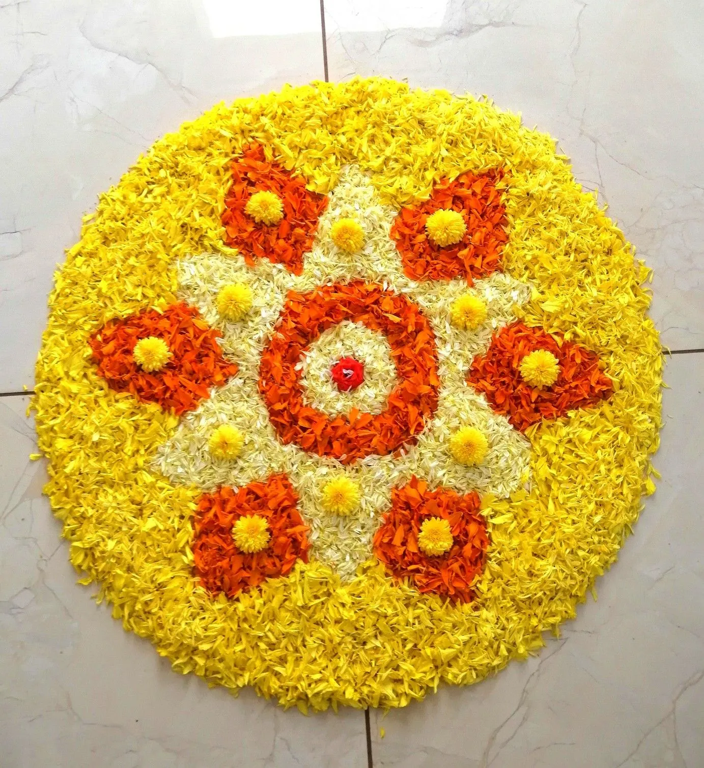 Simple Onam Athapookalam Design with Yellow Flower petals