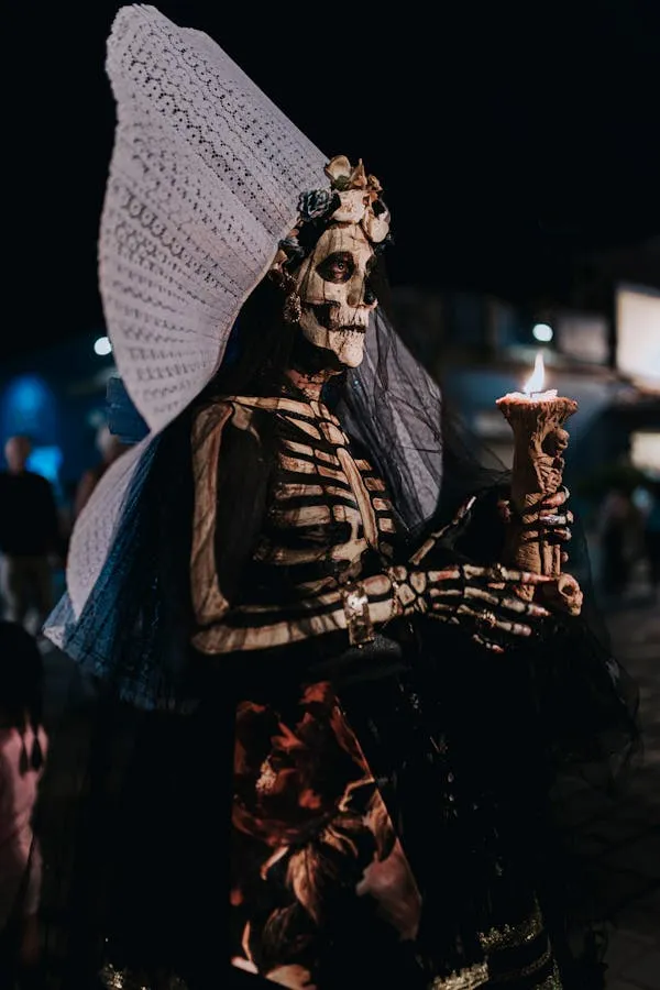 Skeleton costume with wings in festive night scene Wallpaper