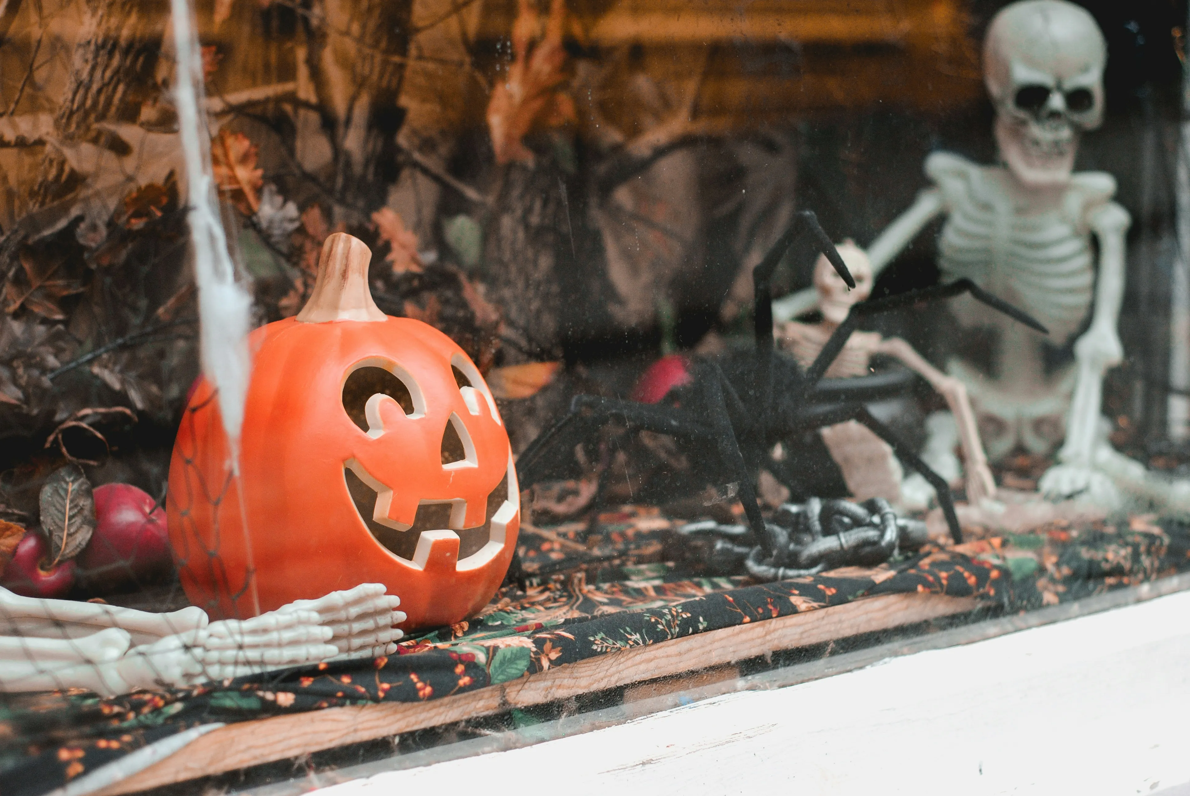 Skeleton with Pumpkins in Vintage Halloween Scene Image