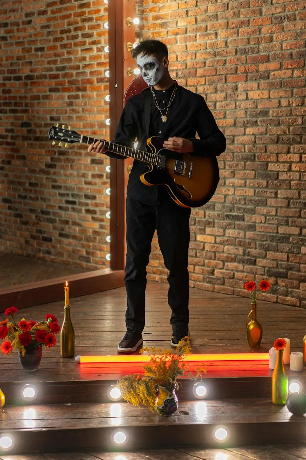 Skilled Guitarist Performing at Halloween Festival with costume