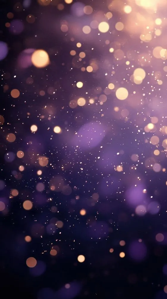 Soft Glow of Purple Sparkles in Dark Background Wallpaper