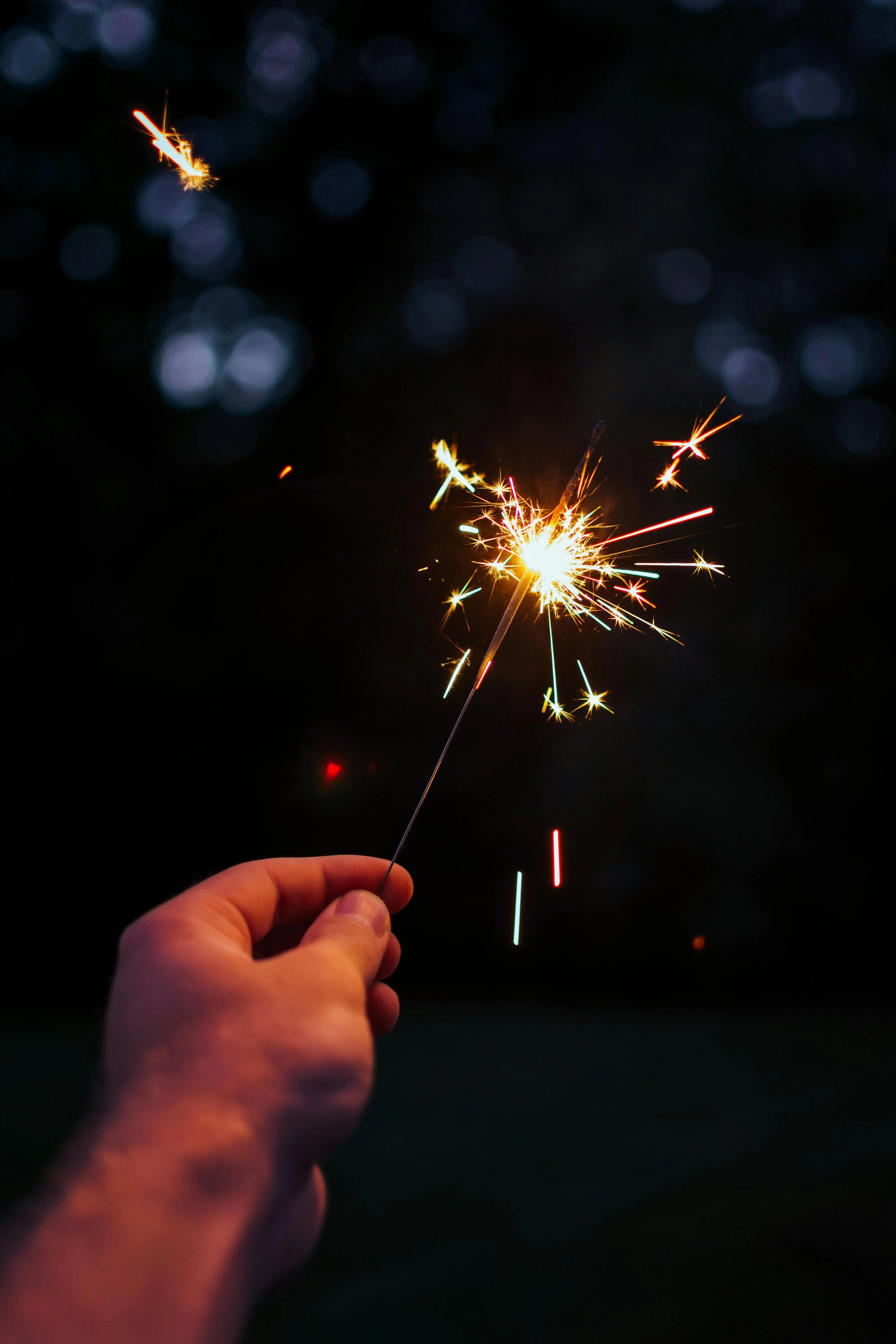Sparkler creating a beautiful light trail in the dark