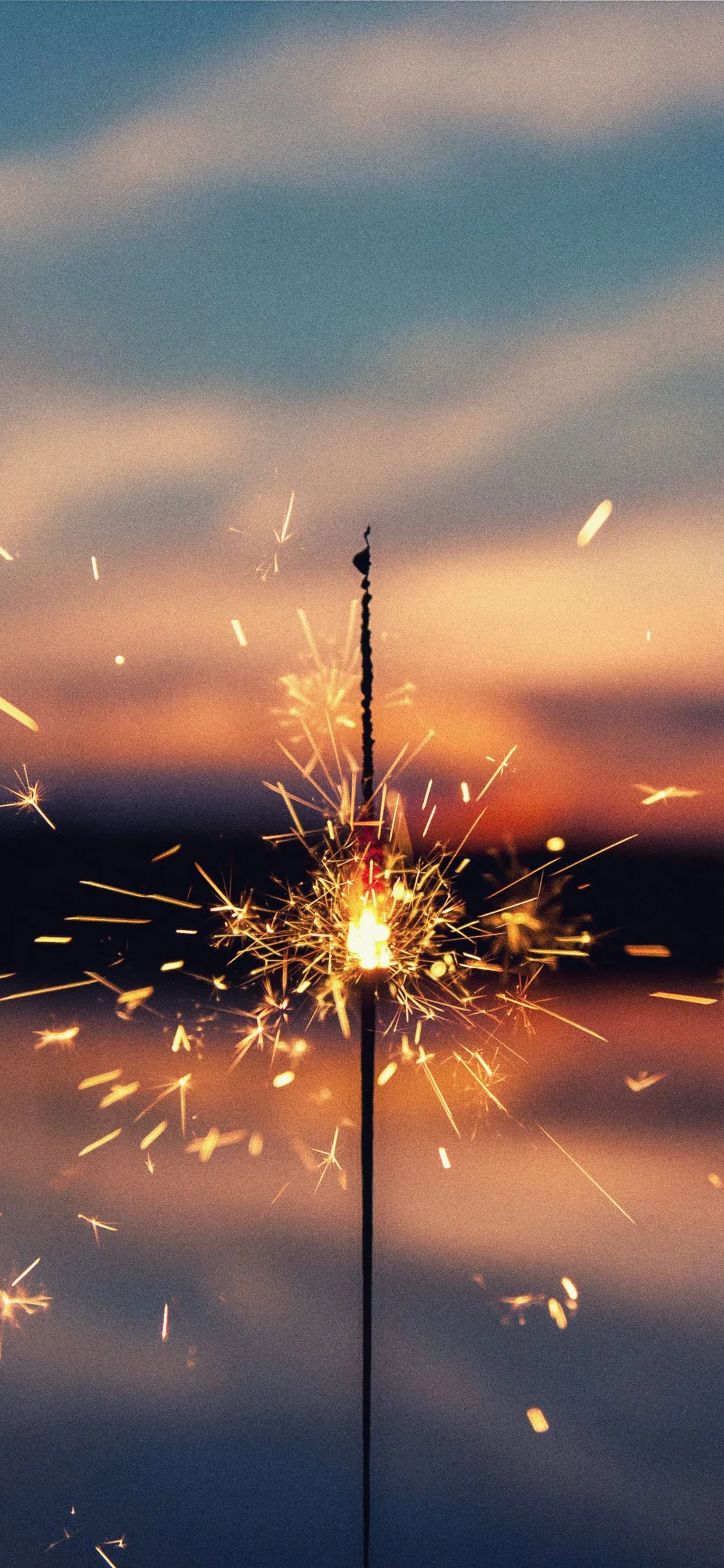 Sparkler Creating Glowing Light Trails in the Dark Sky