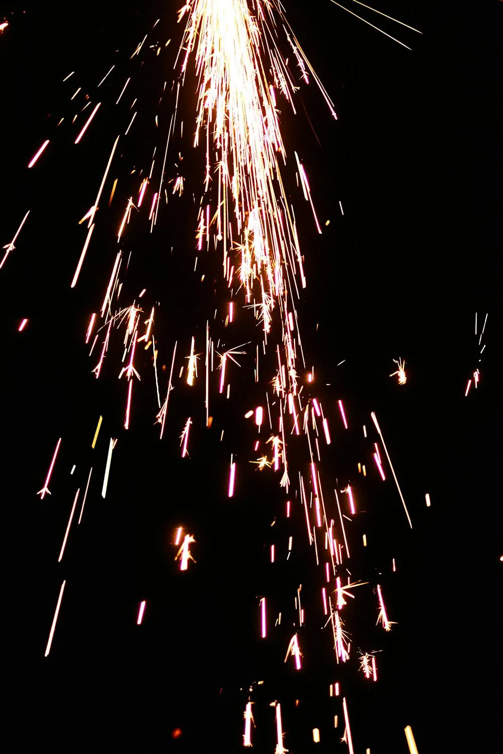 Sparkling fireworks trail illuminating the night sky image