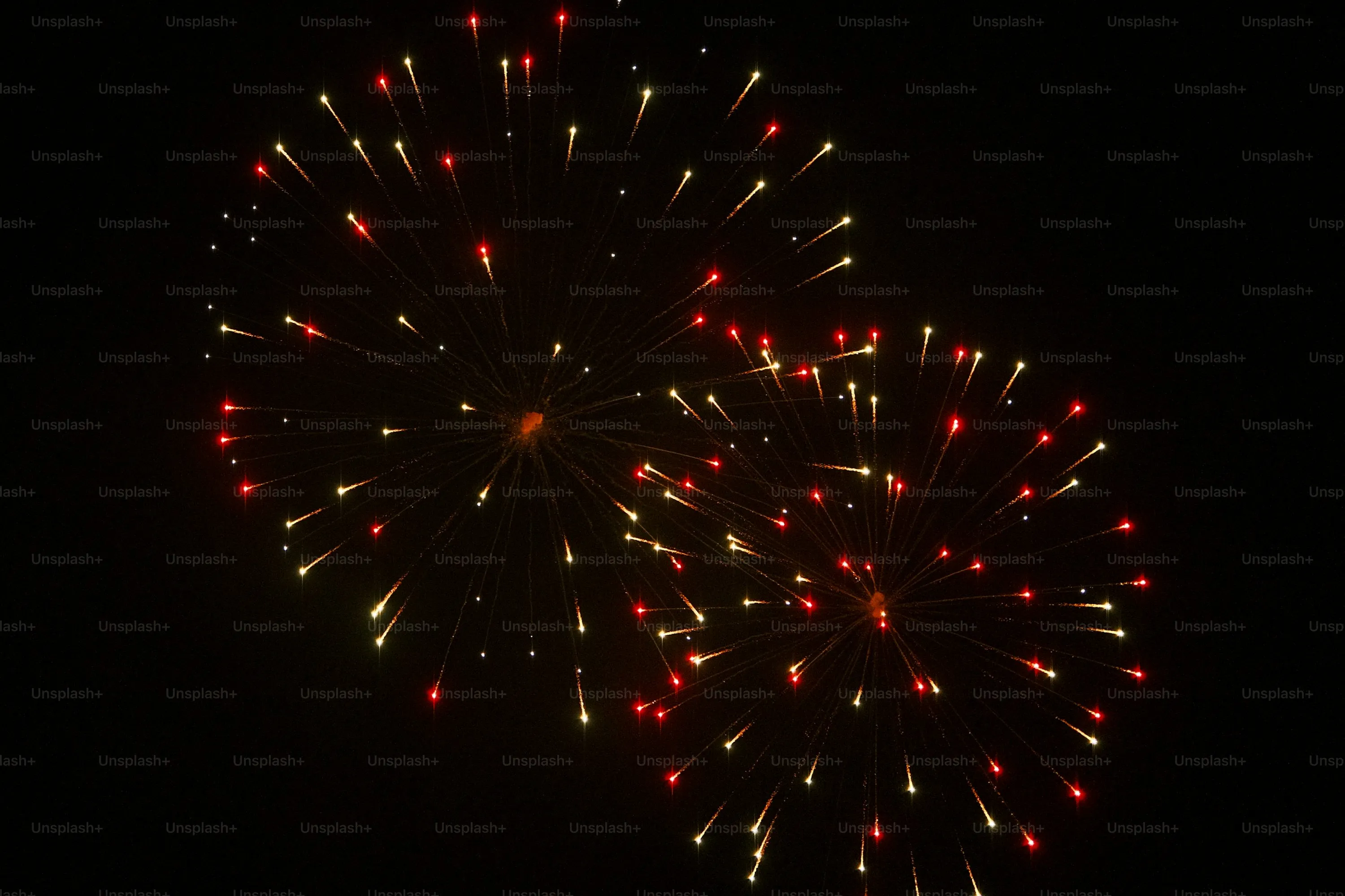 Spirals of Fireworks Lighting up the Night in Multiple Colors