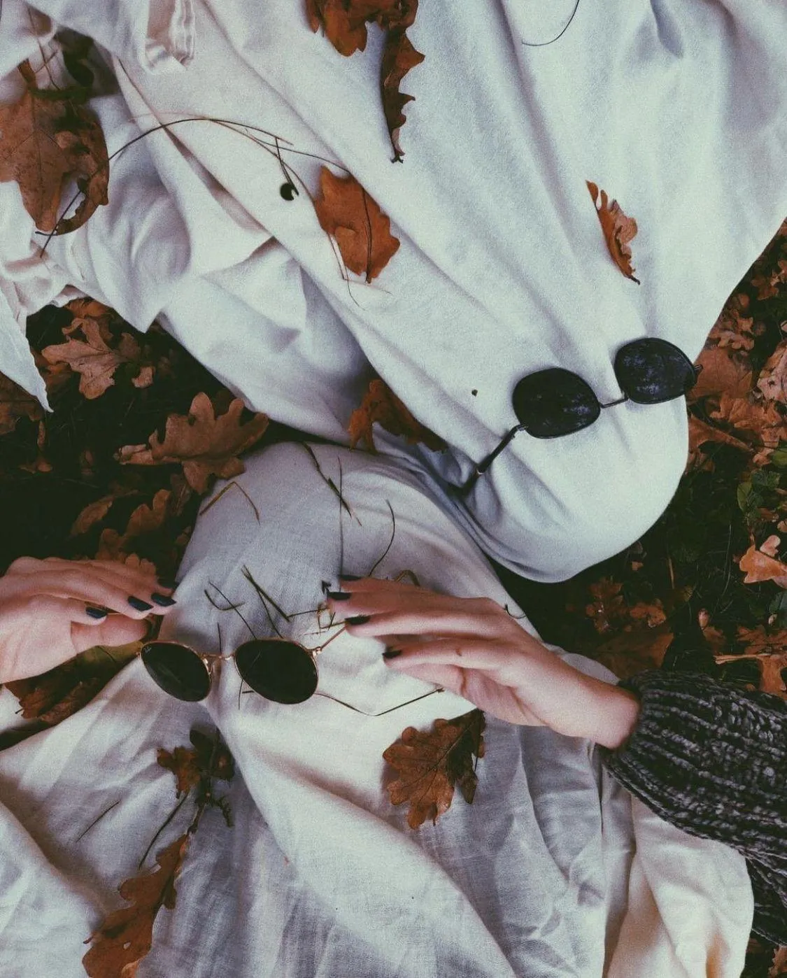 Spooky Halloween Costume with Sheets and Sunglasses
