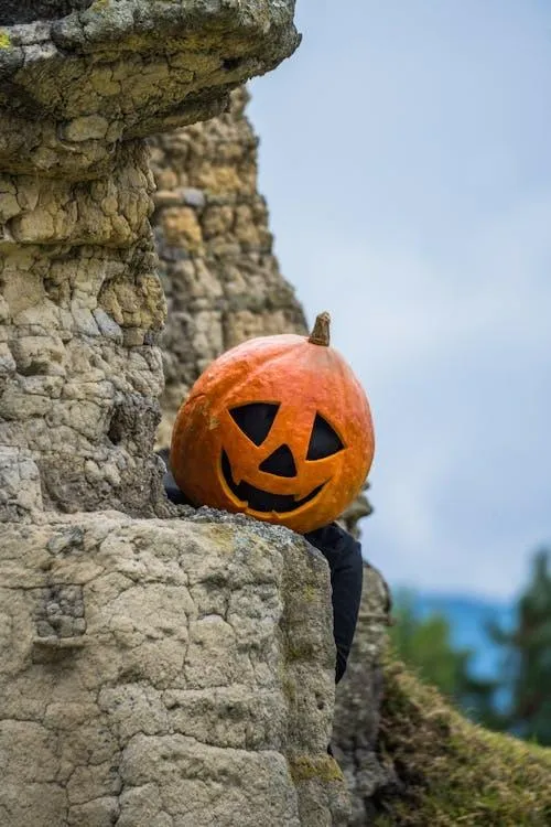 Spooky Jack O Lantern Fun at Historic Stone Ruins Wallpaper