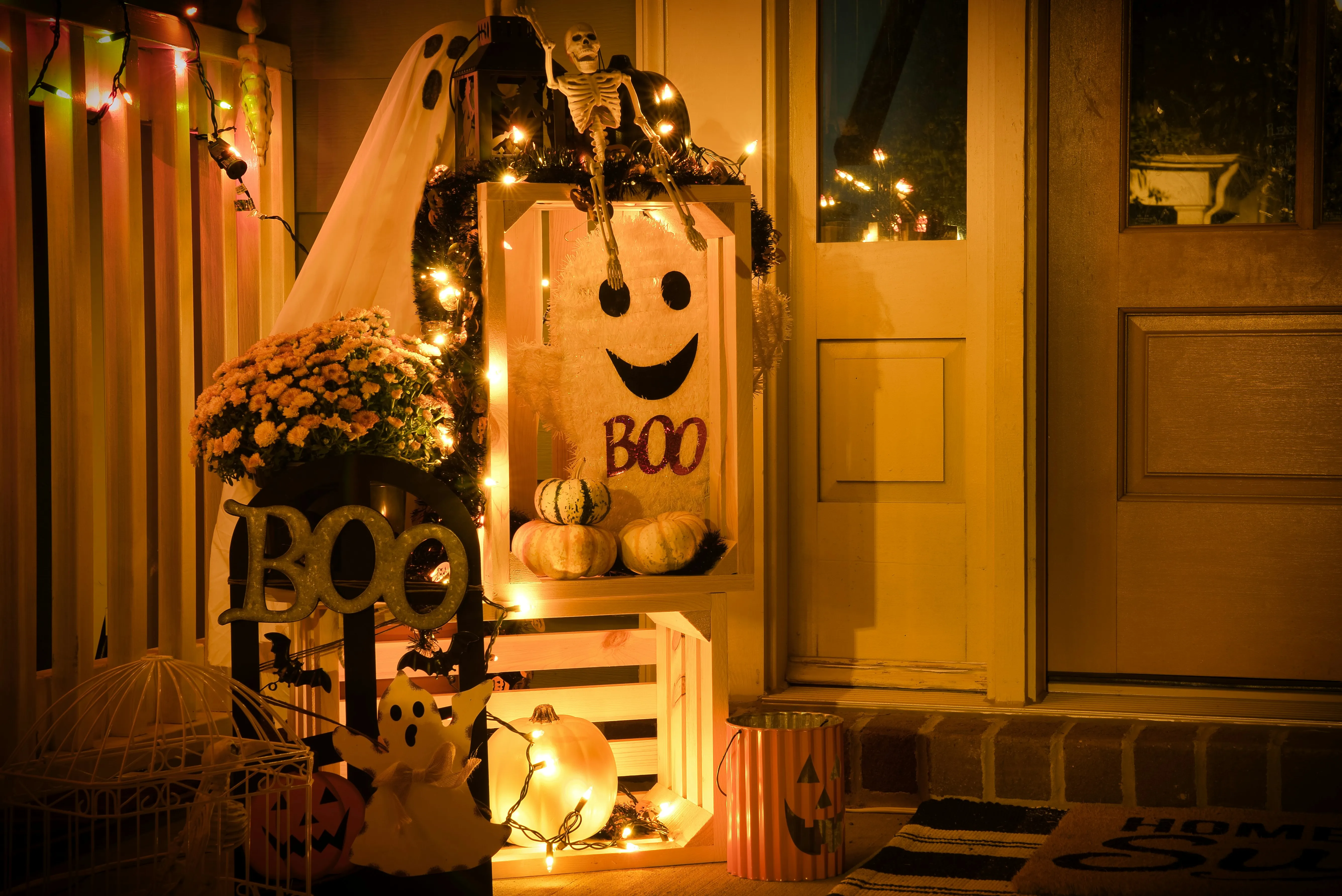 Spooky Porch Decor with Ghost and Pumpkins with Boo Text