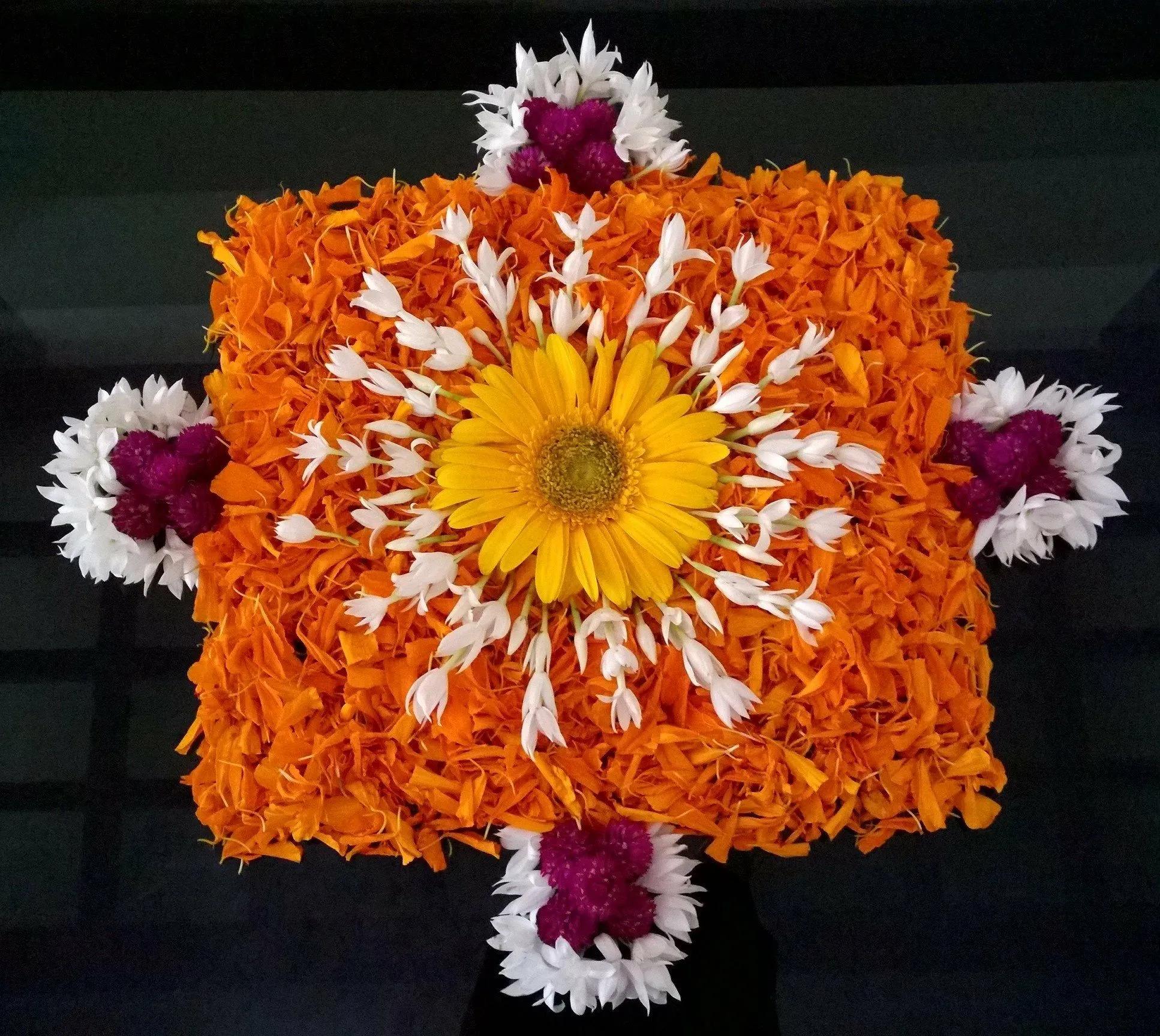 Square Floral Pookolam with sunflower centerpiece Wallpaper