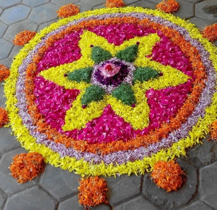 Star Shape Onam Kolam design with Lotus flower at the center