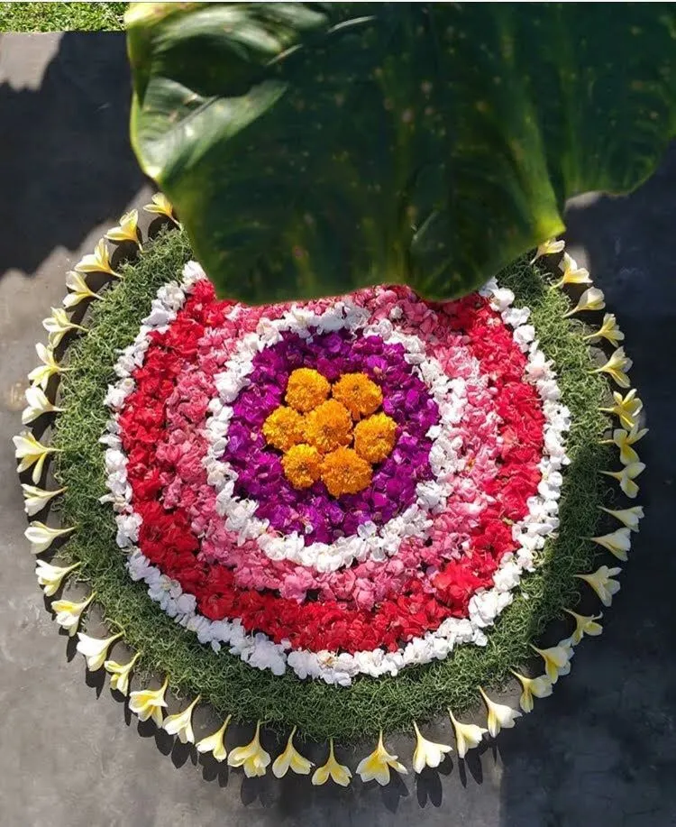 Stunning Circular Pookalam with fresh Flowers and Leaves