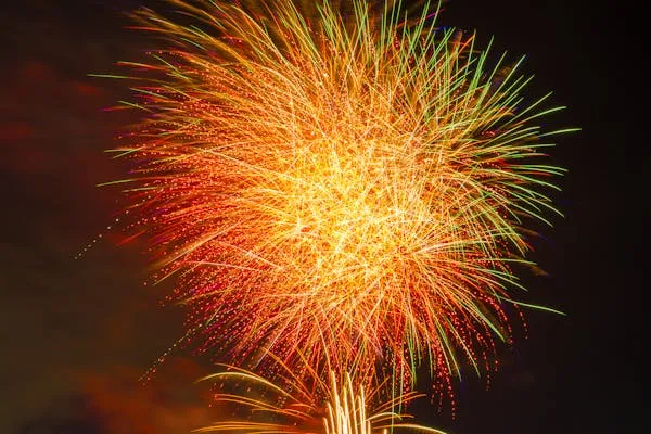Stunning Firework Display with Bright Reds and Greens