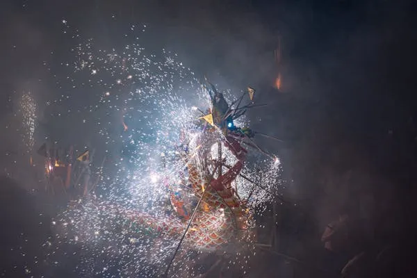Stunning Firework Explosion Amidst Sparks and Smoke