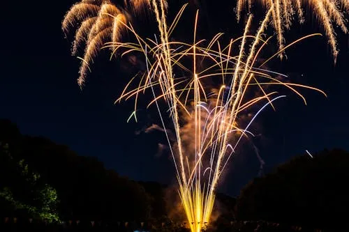 Stunning Firework Trails over the Mountain Landscape 4K