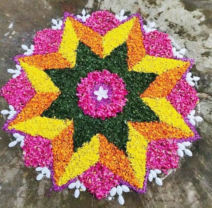 Stunning floral star layered pookolam design for Onam image