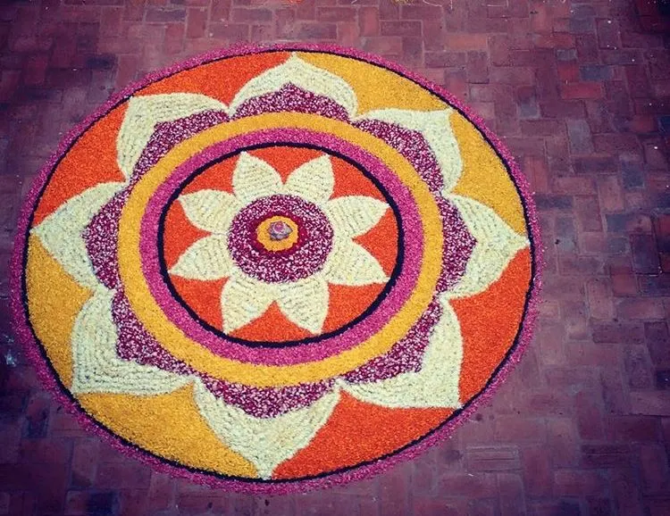 Stunning Onam pookalam design with floral Mandala Design