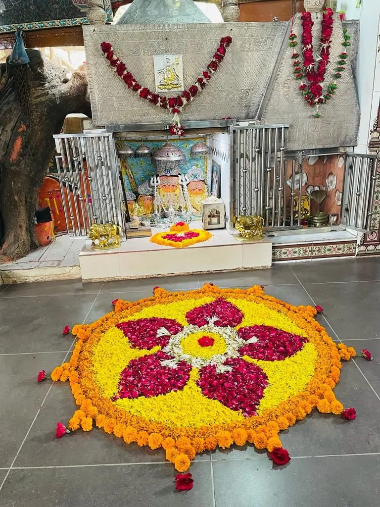 Temple flower Rangoli Design with marigold and rose Petals