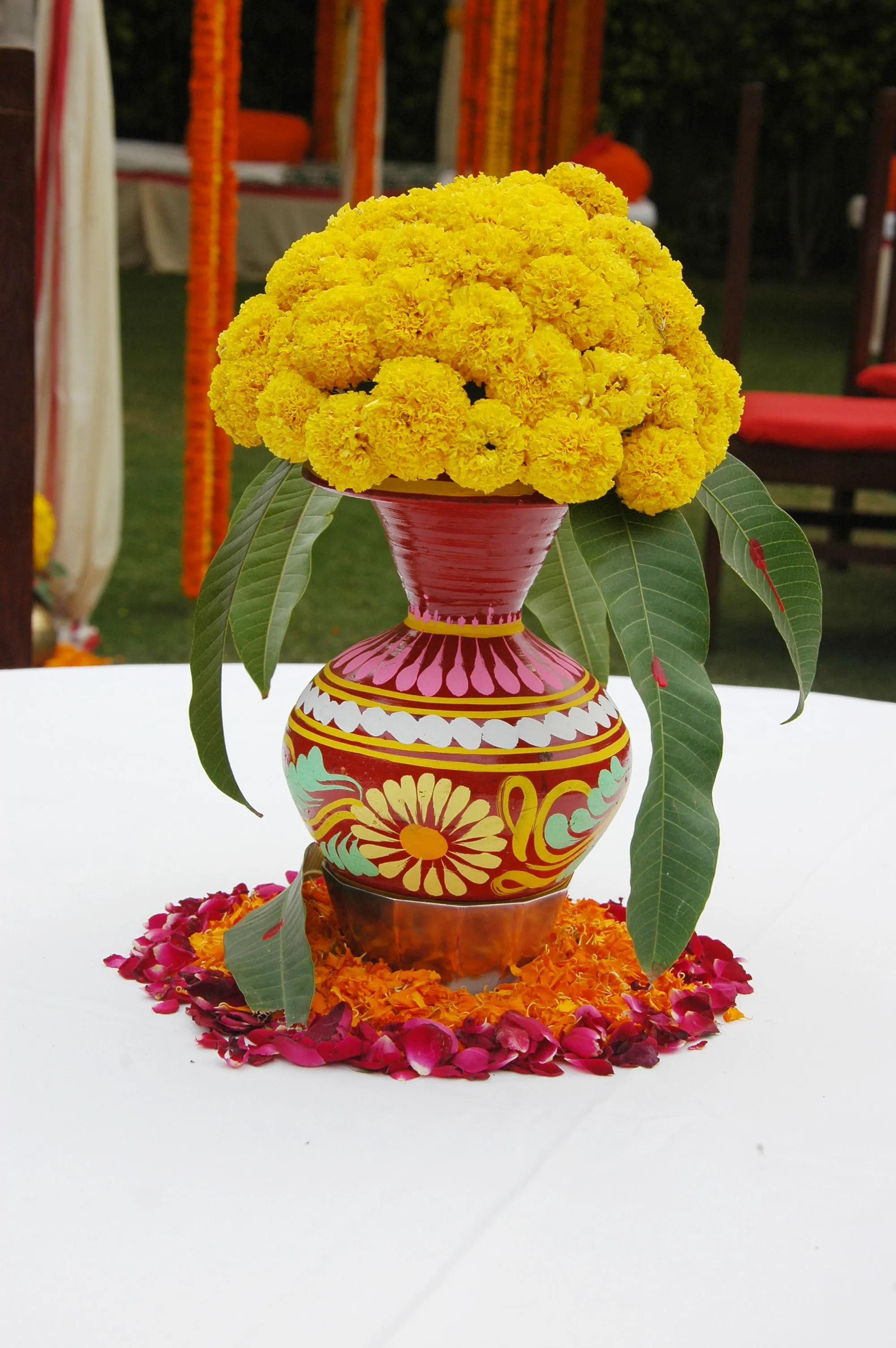 Traditional Kalash flower decoration with Marigolds image