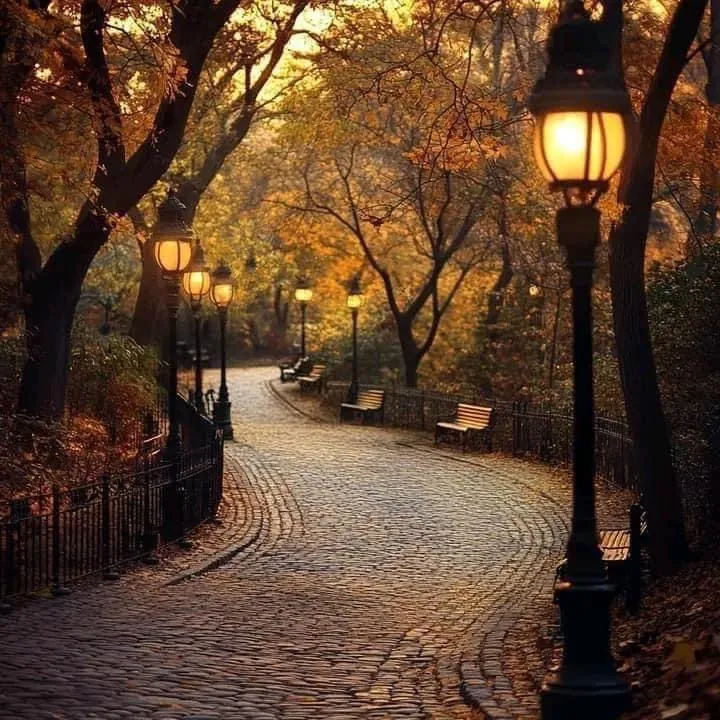Tranquil Autumn Park Path with Golden Fall Leaves Wallpaper