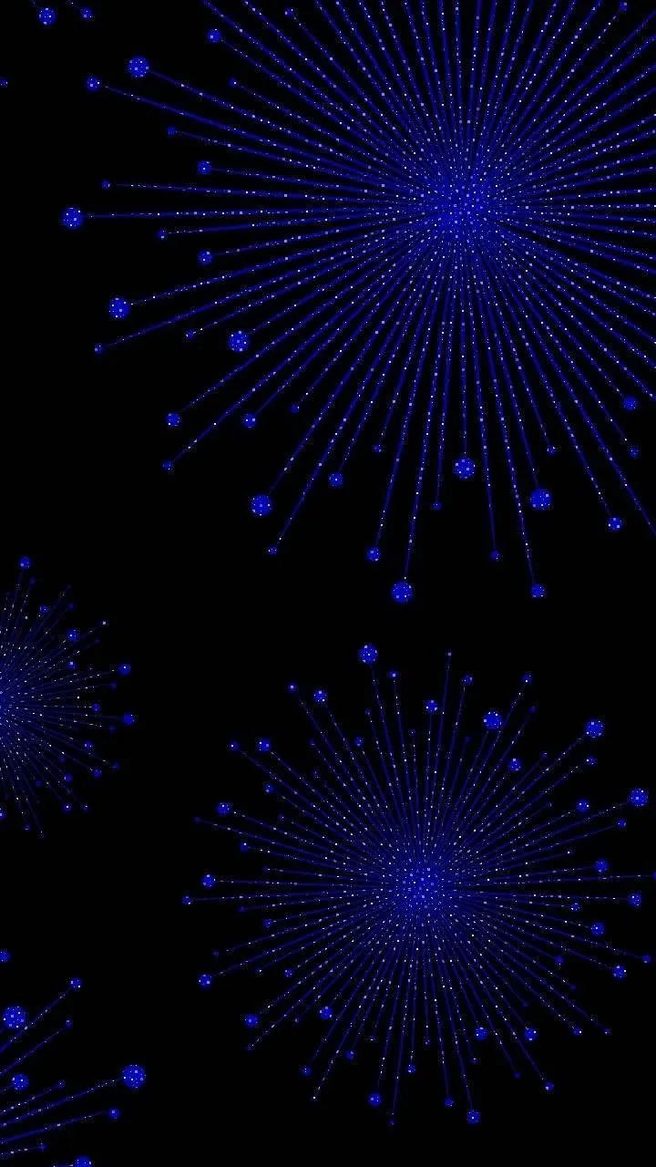 Vibrant Blue Fireworks Lighting the Night Sky Wallpaper