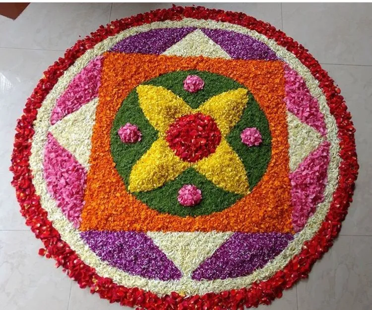 Vibrant Circular Flower Pookolam with Geometric Patterns