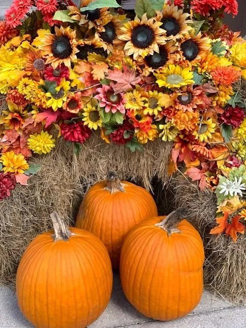 Vibrant Fall Pumpkin and Sunflower Wreath Decoration Image