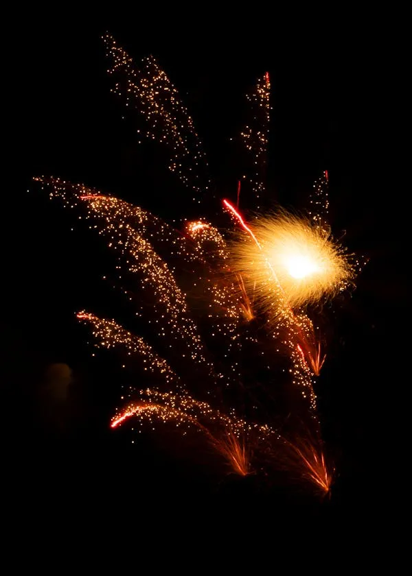 Vibrant Firework Burst with Fiery Red and Yellow Colors