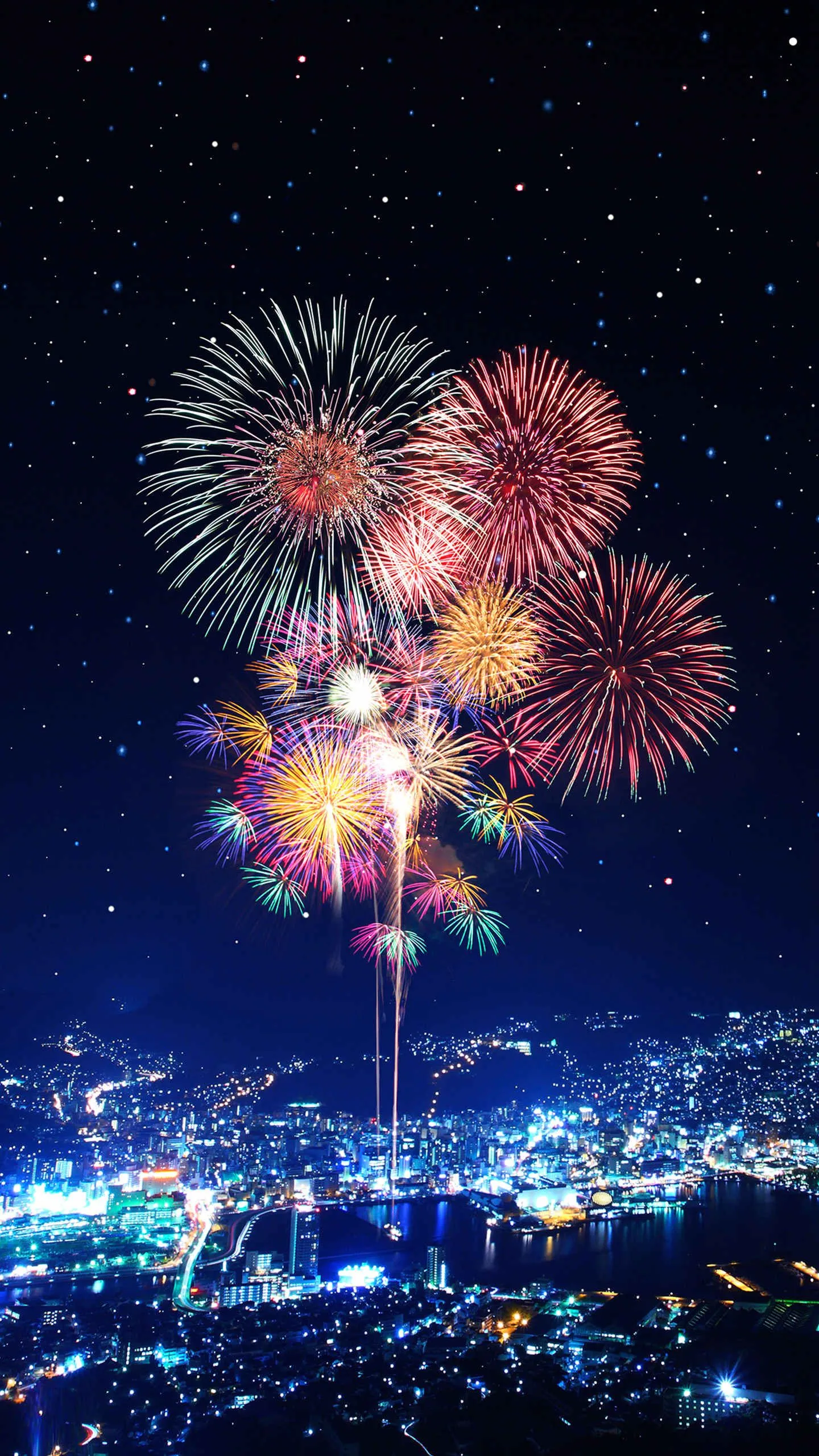 Vibrant Fireworks Bursting over the City in Bright Colors